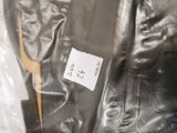 a plastic bag that has a pair of scissors in it
