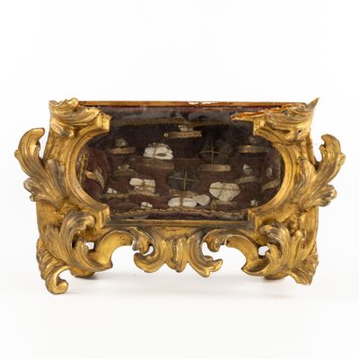 a picture of a gold frame with a ship in it