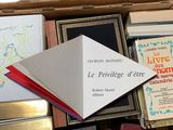 a box full of books that are sitting on a table