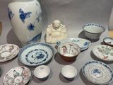 a table with a lot of different plates and bowls on it