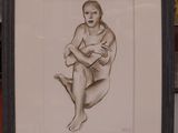 dessin encadré représentant une femme nue assise à genoux