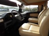 a view of the inside of a vehicle from the driver ' s seat