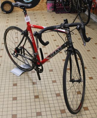 a bike that is sitting on a stand in a store