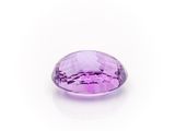 a purple amethorate gems on a white background