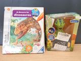 a box with a toy dinosaur and a box with a picture of a dinosaur