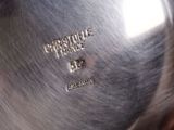 a close up of a metal pan with a handle