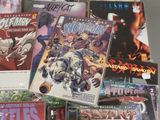 a lot of comic books that are on the table