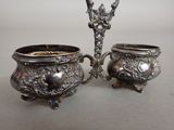 pair of antique silverplated sugar and creamers on stand