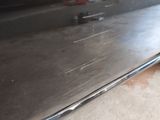 a close up of a car door with a handle on it