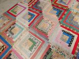 a quilt made to look like a patchwork quilt