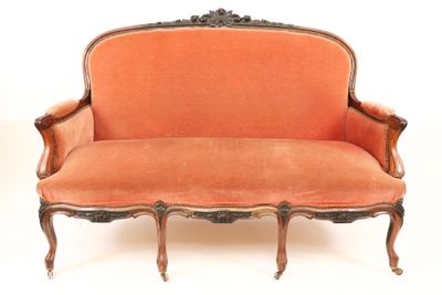 a couch that is sitting on a white surface