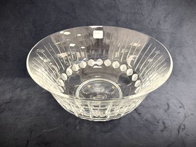 a glass bowl that is sitting on a table