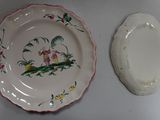 two plates that are sitting on a table