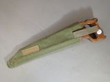 a knife that is laying on a table