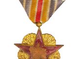 an image of a medal with a star on top of it