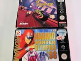 two nintendo games are sitting on a table next to each other