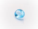 a blue topazte gems on a white background