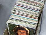 a lot of records stacked on top of each other