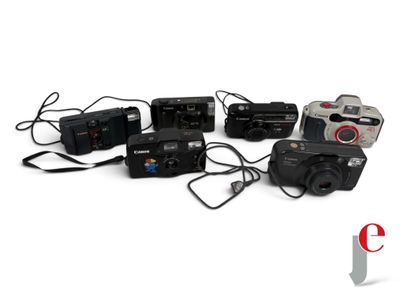 many cameras that are connected to each other on a white surface