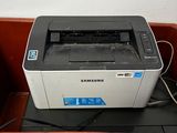 a printer that is sitting on top of a box