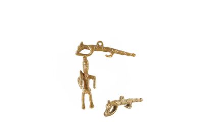 two giraffes and a gun are shown on a white background