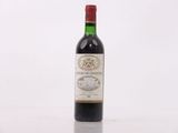 a bottle of wine that is sitting on a table