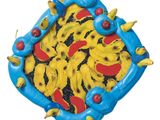 un gâteau bleu et jaune garni de bananes
