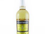 a bottle of chartreuse lemon liqueur on a white background