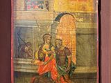 un vieux tableau représentant un homme et une femme assis sur un banc