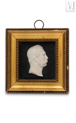 an old picture of a man in a gold frame with a black background