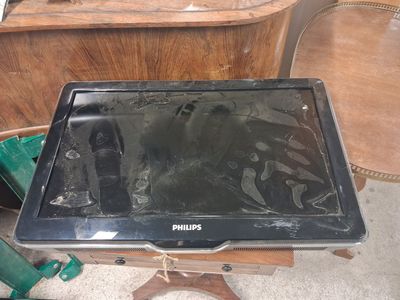 an old television sitting on a table in a room