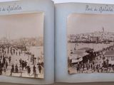 an old photo of a group of people walking on a beach