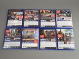 a lot of video game covers on the table