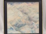 a painting of clouds in a black frame on a white background