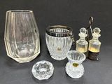 a lot of glass items that are on a table