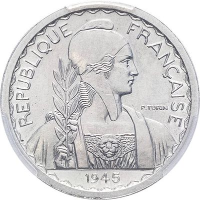 a close up of a coin on a white background with a picture of a woman