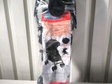 a bag of clothes that is wrapped up on a table
