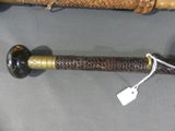 two different types of canes on display on a table