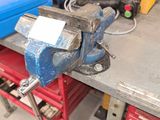 an image of a viset on a workbench in a garage