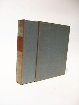 a book that is sitting on a white surface