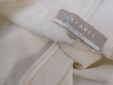 a close up of a white shirt with a label on it