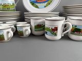 many cups and saucers with pictures on them