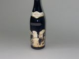 a bottle of wine that is sitting on a table