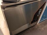 a small machine that is sitting on top of a counter