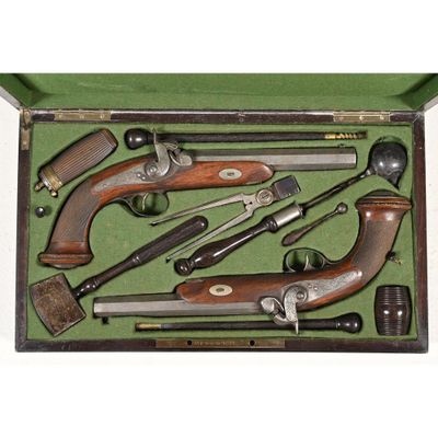 a box with a bunch of guns inside of it