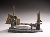 sculpture représentant un morceau de bois d'où sort un autre morceau de bois sur le côté