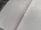 a close up of a seat in a car with a cloth on it