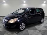 a picture of a black car parked in a garage