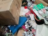 a cardboard box full of assorted items in a room