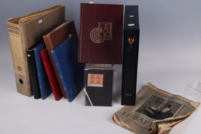 several old books are stacked on top of each other on a table